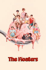Movie poster for The Floaters. Eight teenagers lounge on a giant scoop of melting pink ice cream balanced on a spoon, one playing a ukulele, one reading, one lying on his back with a phone. The illustration sits on a cream background. The title appears in dripping red letters above the tagline "Prepare for a summer meltdown." Camp is in session July 10.