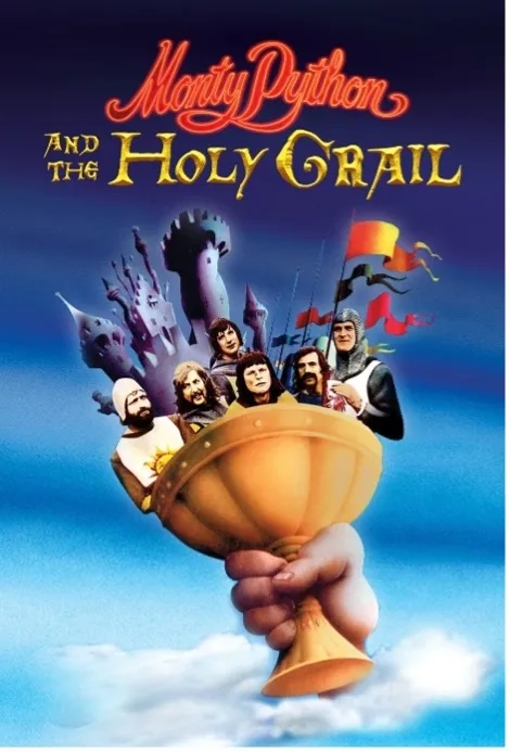 Movie poster for Monty Python and the Holy Grail. A giant hand rises from the clouds holding a gold goblet. Six men in medieval dress stand crowded inside the cup, with a pale castle and red banners behind them against a blue sky. The title appears above in red and yellow lettering.